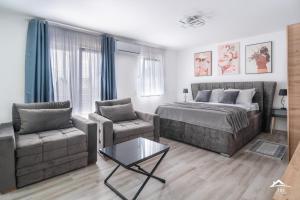 Postel nebo postele na pokoji v ubytování J&S Apartments