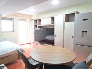 מיטה או מיטות קומותיים בחדר ב-Casa Livia PP Aparthotel