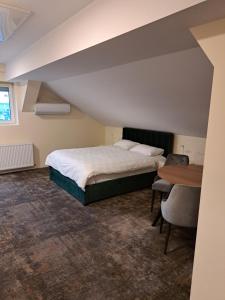 Säng eller sängar i ett rum på Casa Livia PP Aparthotel