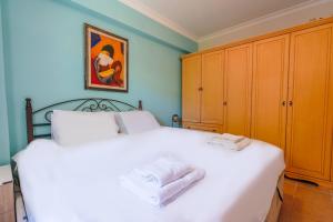 Postel nebo postele na pokoji v ubytování Peaceful Flat with Shared Pool in Camyuva Kemer