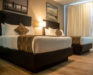 Voodi või voodid majutusasutuse R Hotel Kingston toas
