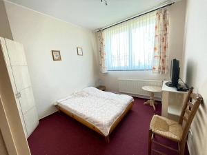 Postel nebo postele na pokoji v ubytování Villa Kunterbunt Willa Śmiesznotka + 35 fotografií