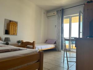 Postel nebo postele na pokoji v ubytování Apartments Djulija