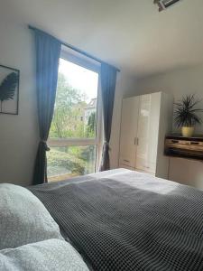 Postel nebo postele na pokoji v ubytování Modernes Apartment in Chemnitz
