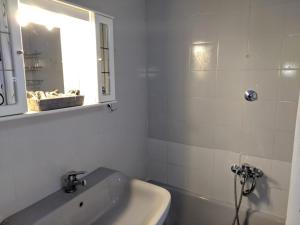 A bathroom at Zennova #3 Mount Athos & Sea View