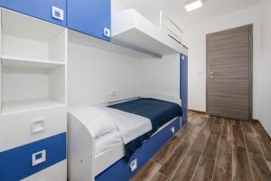 Postel nebo postele na pokoji v ubytování Apartments Gael