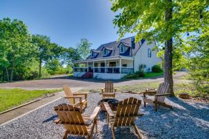 a group of chairs sitting in front of a house at Starkvegas Clubhouse about 2 Mi to MSU Campus! in Starkville