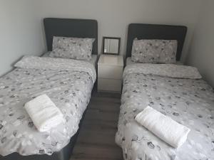 Postel nebo postele na pokoji v ubytování Modern house in Dublin