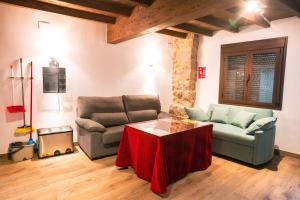 A seating area at Apartamentos A Fala en Trevejo y San Martin de Trevejo, Sierra de Gata