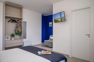 Posteľ alebo postele v izbe v ubytovaní Villa Maria con piscina e vista mare