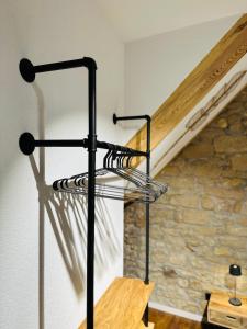 a metal rack in a room with a staircase at Heimat - Ein Stück Heimat im Alltag in Bad Dürkheim