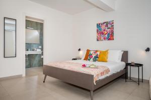 Posteľ alebo postele v izbe v ubytovaní Villa Maria con piscina e vista mare