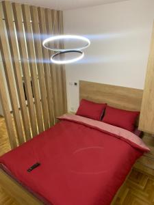 Krevet ili kreveti u jedinici u okviru objekta MAJA Apartment Novi Sad