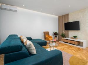 TV a/nebo společenská místnost v ubytování Luxury Apartment Beyond