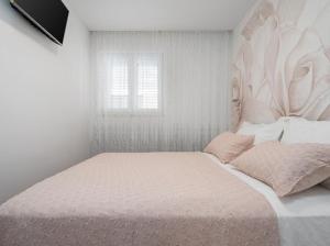 Postel nebo postele na pokoji v ubytování Luxury Apartment Beyond
