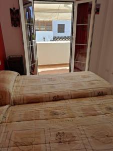 Kama o mga kama sa kuwarto sa Nuevo!! Apartamento a 900 metros de la Playa.