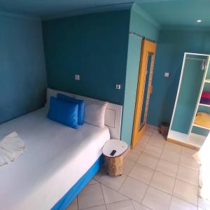 Kadavu Accommodations tesisinde bir odada yatak veya yataklar