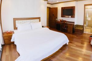 Postel nebo postele na pokoji v ubytování The Allen Hotel