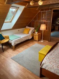 A bed or beds in a room at Vidiecky dom AlexSandra - ubytovanie v súkromí