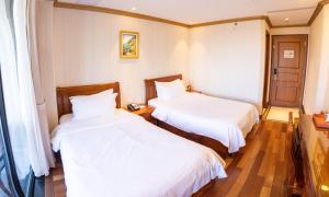 Postel nebo postele na pokoji v ubytování The Allen Hotel
