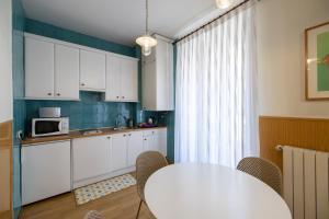 Kuchnia lub aneks kuchenny w obiekcie Oriente Suites