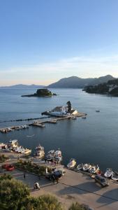 a view of a harbor with boats in the water at Vasiliki Little House in Kanoni