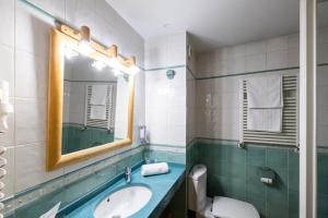 Łazienka w obiekcie Oriente Suites