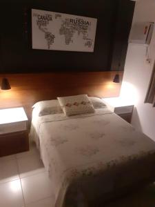 Säng eller sängar i ett rum på Apartmento Condominio Paradise Lake Dom Pedro
