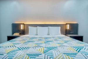 Postel nebo postele na pokoji v ubytování Motel 6 Texarkana, TX