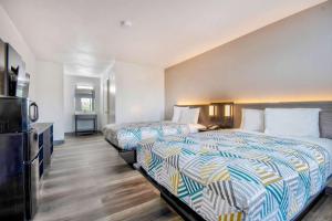 Postel nebo postele na pokoji v ubytování Motel 6 Texarkana, TX