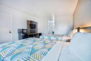 Postel nebo postele na pokoji v ubytování Motel 6 Texarkana, TX