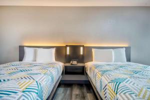 Postel nebo postele na pokoji v ubytování Motel 6 Texarkana, TX