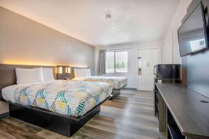 Postel nebo postele na pokoji v ubytování Motel 6 Texarkana, TX