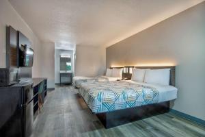 Postel nebo postele na pokoji v ubytování Motel 6 Texarkana, TX