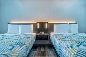 Postel nebo postele na pokoji v ubytování Motel 6 Texarkana, TX