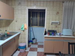 a kitchen with a sink and a counter top at Disfruta de un barrio tranquilo in Alcalá de Guadaira +82 photos