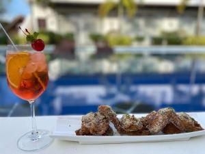 Nápoje v ubytování Bella Napoli Resort & Resto