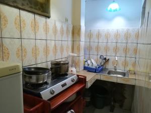 Kuchyň nebo kuchyňský kout v ubytování Appartement meublé Douala Bonapriso Savio