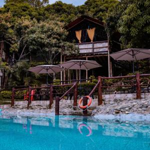 Bazén v ubytování Glamping Mirador Santa Fe-Sopetran nebo v jeho okolí