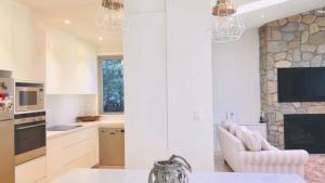 Kuchyň nebo kuchyňský kout v ubytování Coastal Soul - Pearl Beach