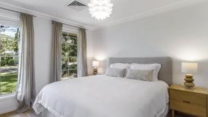 Ένα ή περισσότερα κρεβάτια σε δωμάτιο στο Superb Family Beach House +7 φωτογραφίες
