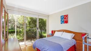 Postel nebo postele na pokoji v ubytování Beach Point - Wifi, Pet Friendly & Airconditioned