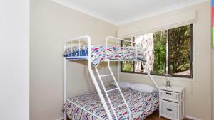 Postel nebo postele na pokoji v ubytování Beach Point - Wifi, Pet Friendly & Airconditioned
