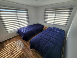 Postel nebo postele na pokoji v ubytování Casa blanca bella vista