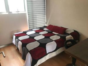 En eller flere senge i et værelse på Home sweet home in CDMX near Polanco and Reforma + 13 billeder