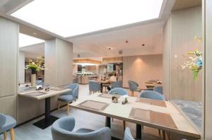 O zonă de relaxare la 义乌曼卡兰酒店国际商贸城店Yiwu kaiding Hotel