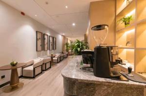 O zonă de relaxare la 义乌曼卡兰酒店国际商贸城店Yiwu kaiding Hotel