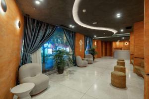 Χώρος καθιστικού στο Jacayl Hotel TCG