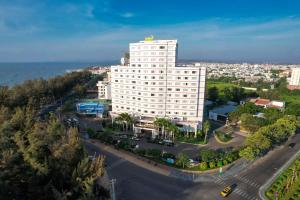 an overhead view of a large white building at TTC Hotel Phan Thiet in Phan Thiet