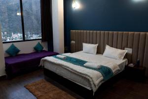 Postel nebo postele na pokoji v ubytování Spontrail Hostel
